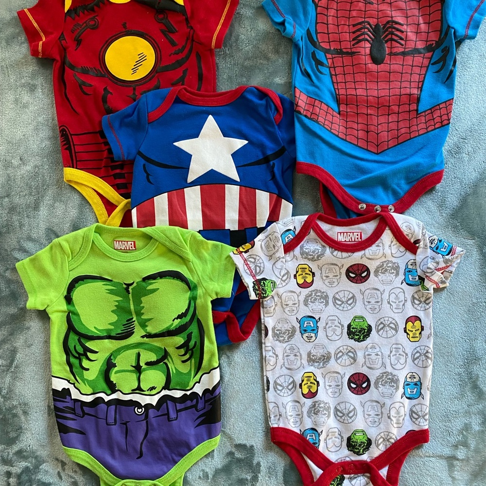 5 piece onesie bundle. Size 3/6M. Never worn.